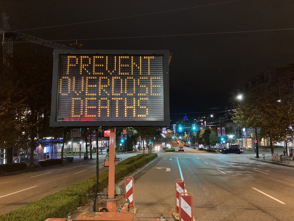 Electronic traffic sign reading "prevent overdose deaths"