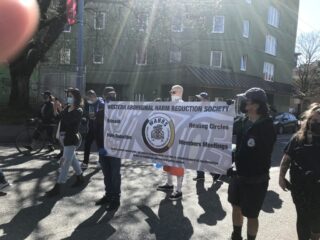 People holding a banner