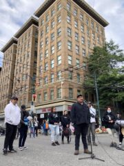 A man speaking on a microphone