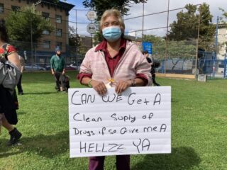 A person holding a sign